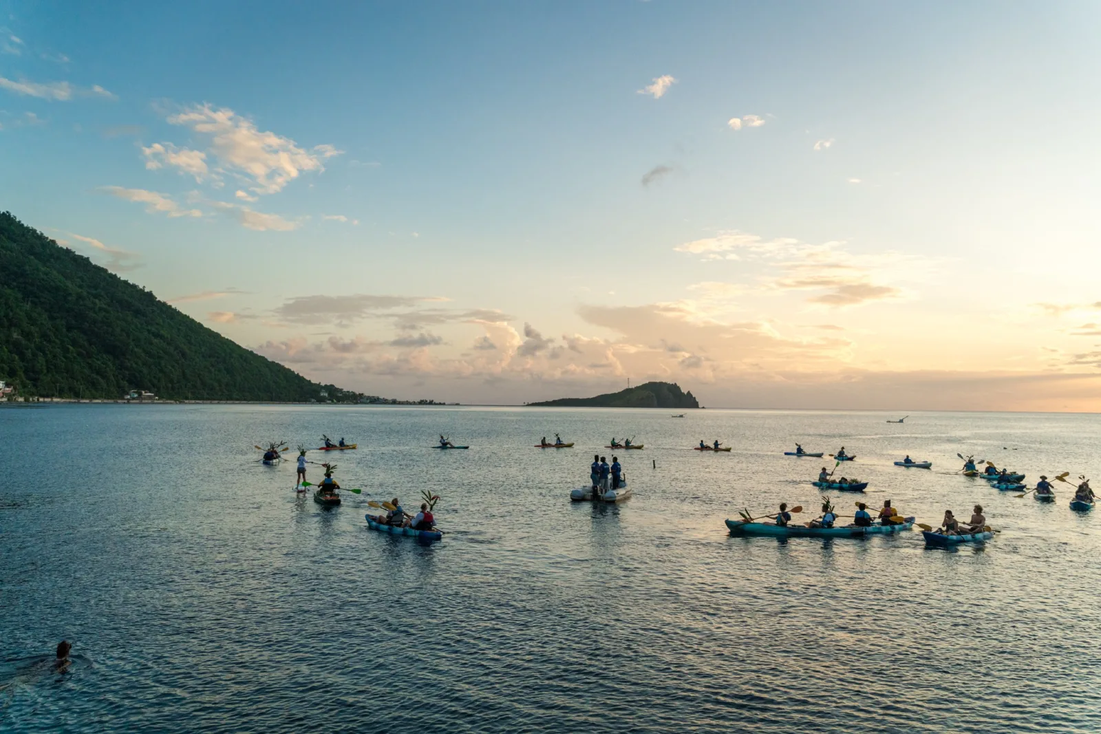 Boats on the water off Dominica at dusk