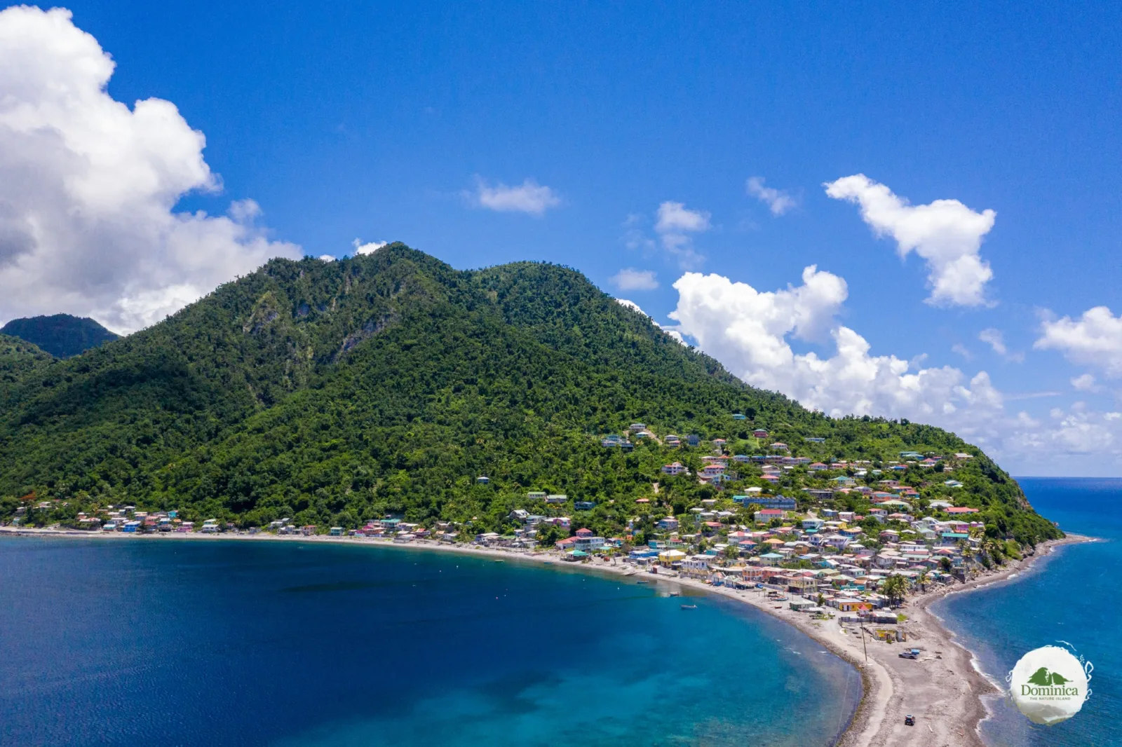 A Dominican coastal village on a green ridge